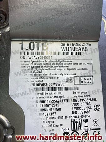 Наклейка под наклейкой жесткого диска